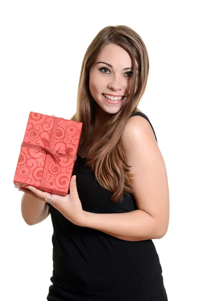 Teen girl holding christmas present — Stock Photo, Image