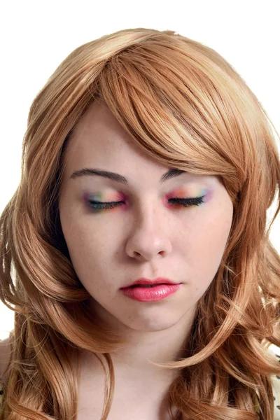 Tiener meisje met regenboog oogschaduw — Stockfoto