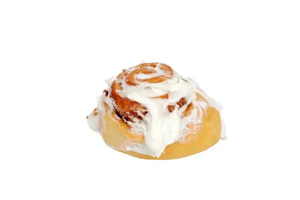 Isolated cinnamon bun with icing — Stock Photo, Image