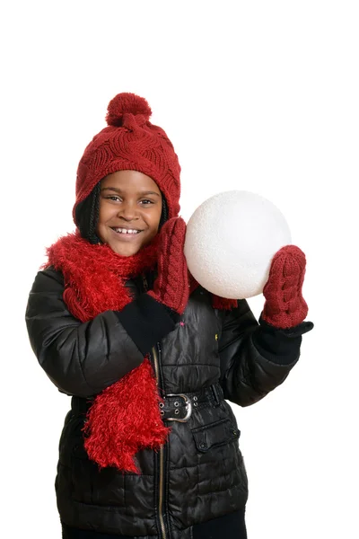 Criança feliz com bola de neve gigante — Fotografia de Stock