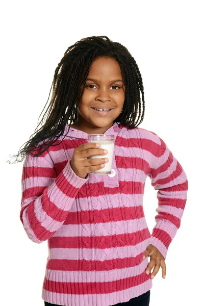 Little black girl with glass milk — Stock Photo, Image