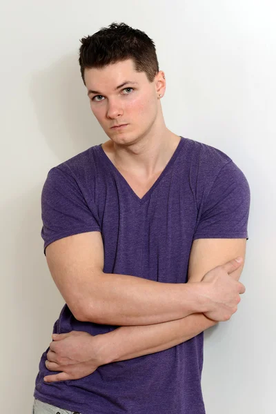 Portrait young man wearing purple shirt — Stock Photo, Image