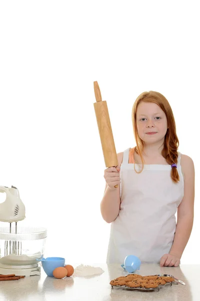 Little girl holding rolling pin — Stock Photo, Image