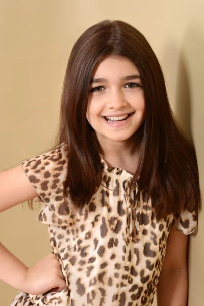 Happy little brunette girl Stock Image