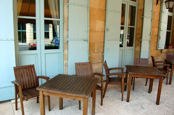 Mesas y sillas de café Imagen de stock