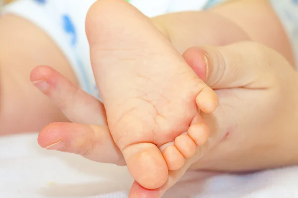 Newborn's feet — Stock Photo, Image