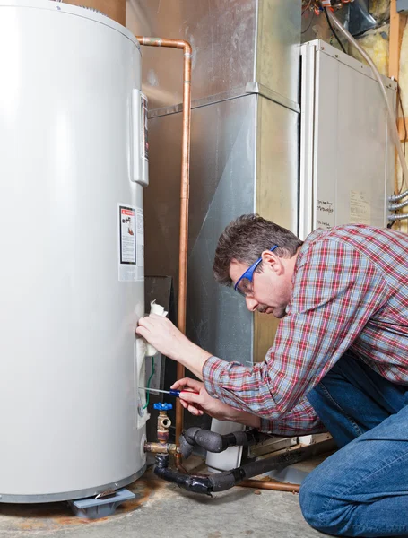 Water heater maintenance — Stock Photo, Image