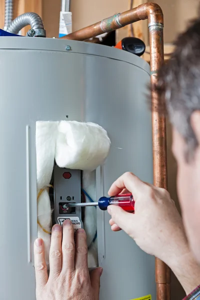 Water heater maintenance — Stock Photo, Image