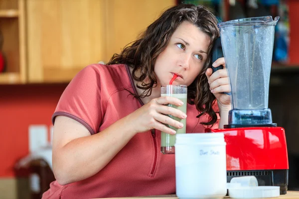 Woman drinks diet shake — Stock Photo, Image