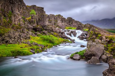 Waterfall in Thingvellir National Park, Iceland clipart