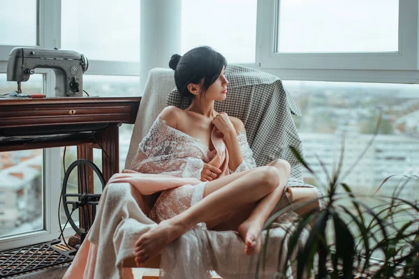 Sexy Girl White Translucent Tunic Sits Sewing Window Beautiful Female — 图库照片