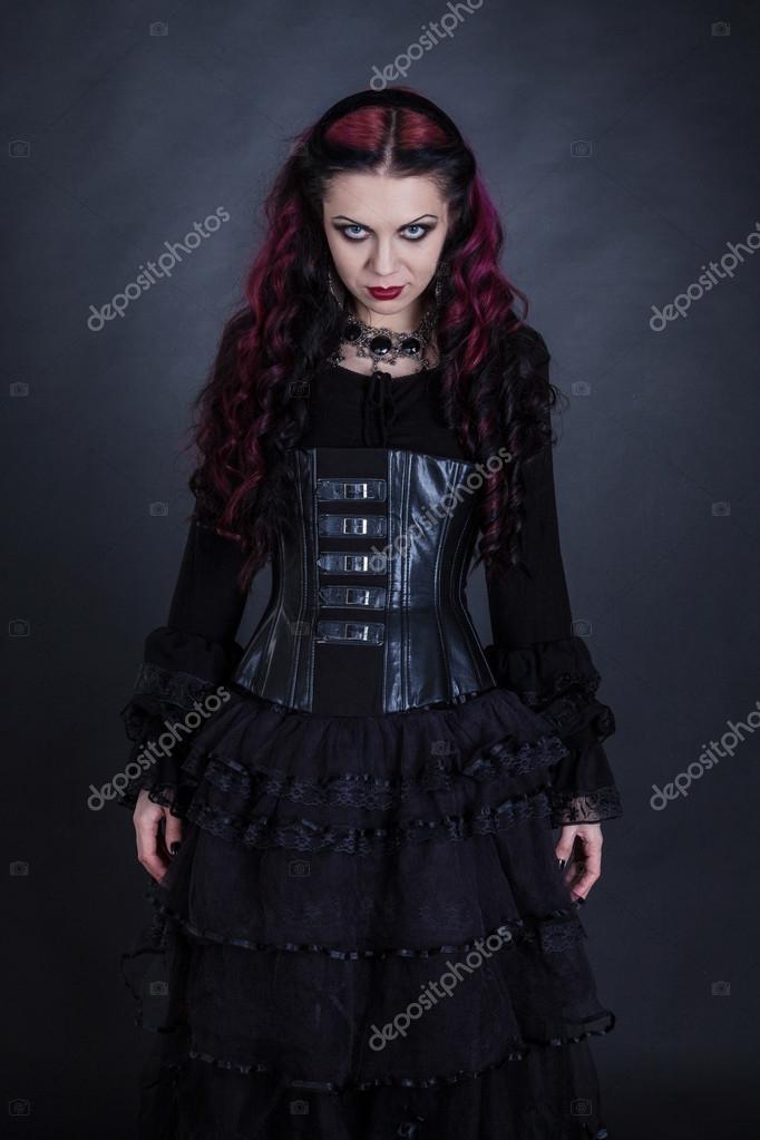 Goth girl with a red hair Stock Photo by ©zabelin 47030809