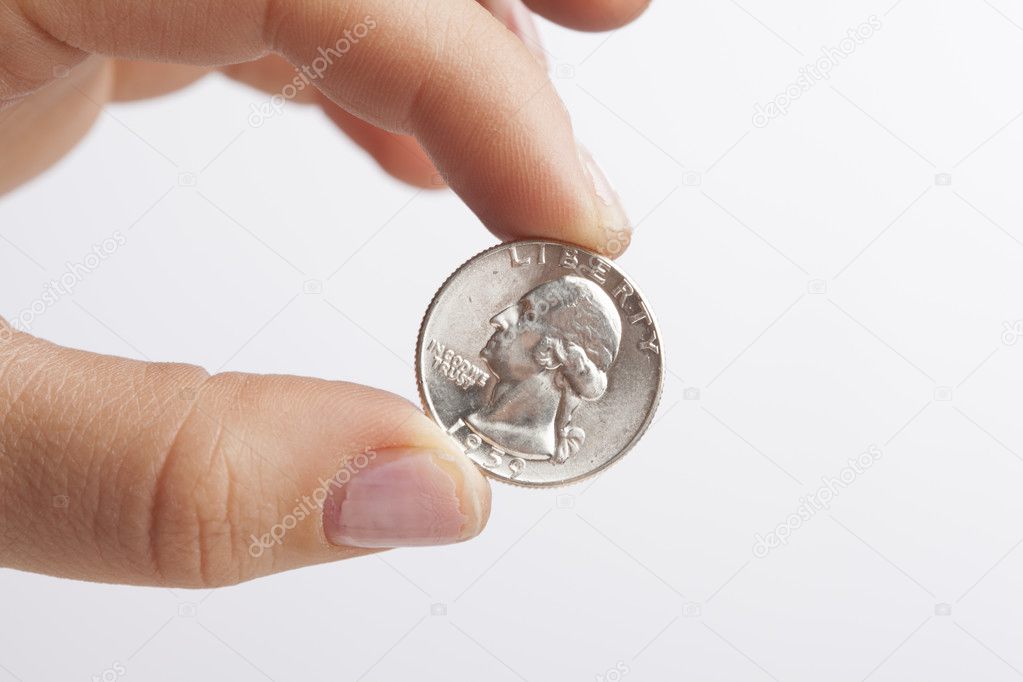 Hand Holding Quarter