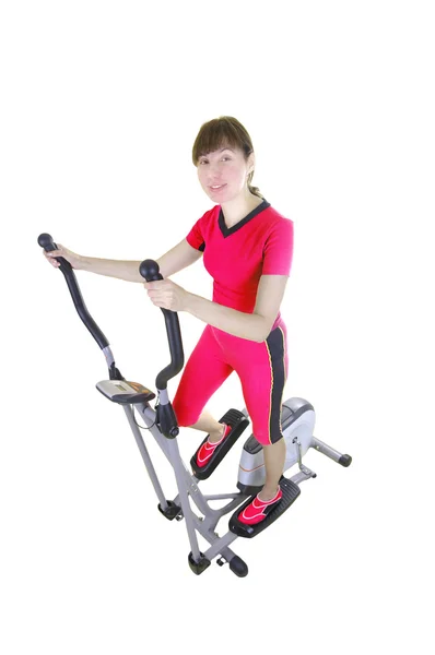 Woman and xtrainer machine — Stock Photo, Image