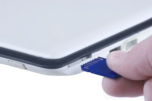 Plugging removable flash disk memory into laptop slot — Stock Photo, Image