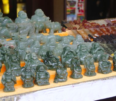 jade figurines Buddhas clipart