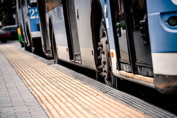 Public transport with an accessible ramp for person with a physical disability.