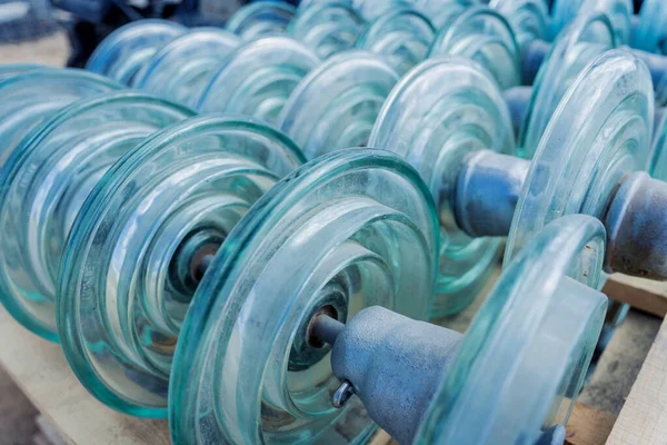 Rows of glass insulators for high voltage power line — Foto Stock