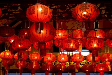 Red lanterns hanging on Chinese temple roof