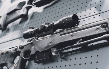 Collection of rifles and carbines on the wall