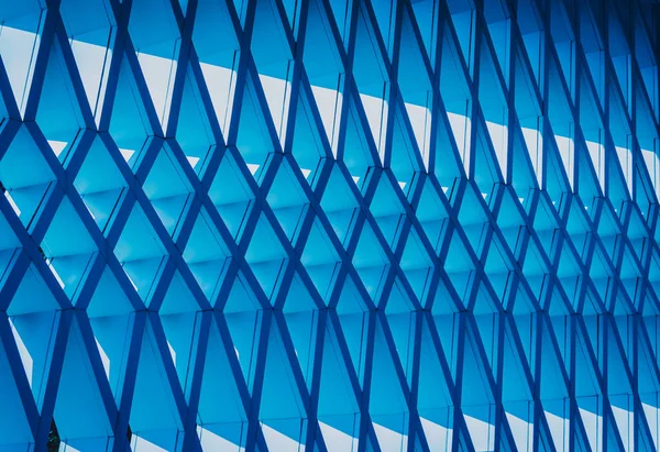 Abstrakter geometrischer Hintergrund mit Dreiecken und Gebäudezellen — Stockfoto