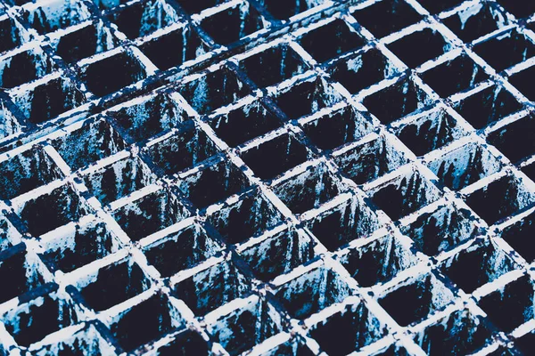 Metal grating on drainage systems in the grass garden — Zdjęcie stockowe