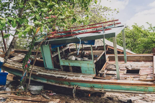 Old thai wooden boat on the beach