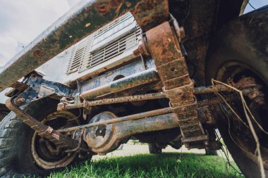 Old rusty cars for safari in the jungle of Africa.