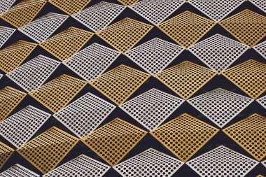 Üçgen ve bina hücreleriyle soyut geometrik arkaplan.