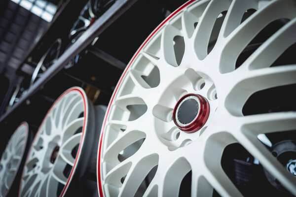 Car metal disc at the black background.