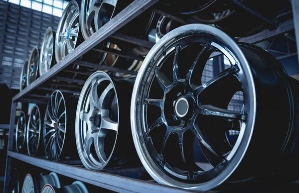 Rows of metal car disks in a shop.