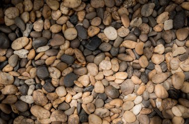 Eski taşlaşmış yolun arka planı ve dokusu.