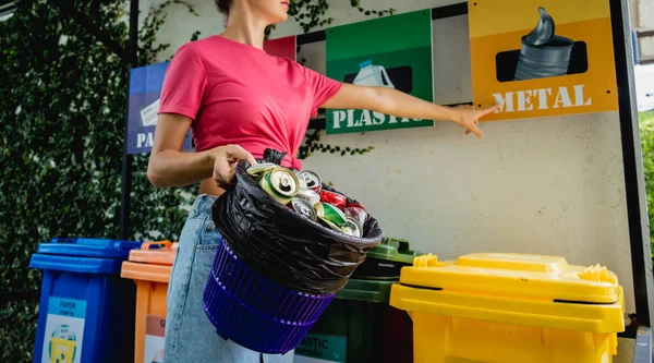 Young Beautiful Girl Throws Sorted Garbage Special Bins — стоковое фото