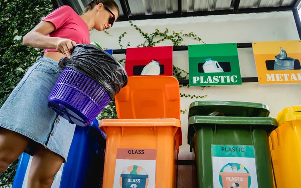 Young Beautiful Girl Throws Sorted Garbage Special Bins — Fotografia de Stock