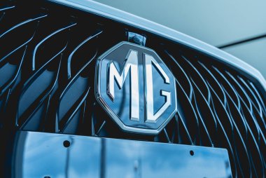 PHUKET, THAILAND - AUGUST 09, 2022: Cars logo of MG Morris Garages in showroom of dealership.