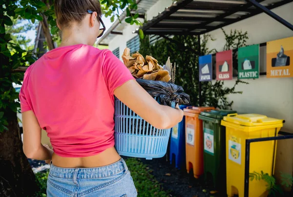 Young Beautiful Girl Throws Sorted Garbage Special Bins — стоковое фото