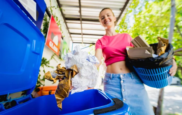 Young Beautiful Girl Throws Sorted Garbage Special Bins — стоковое фото