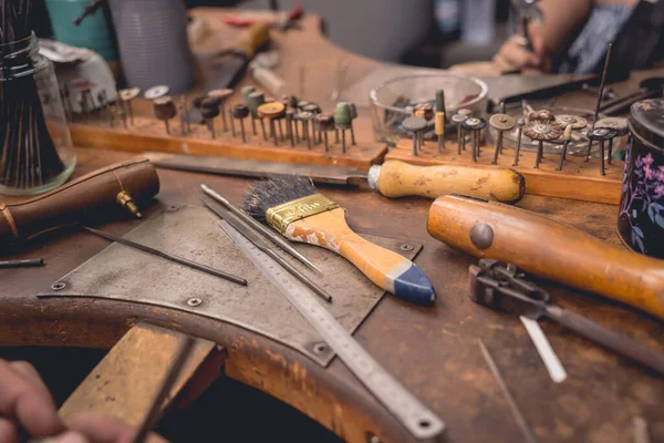 Master class in a large workshop for the manufacture of handmade jewelry.