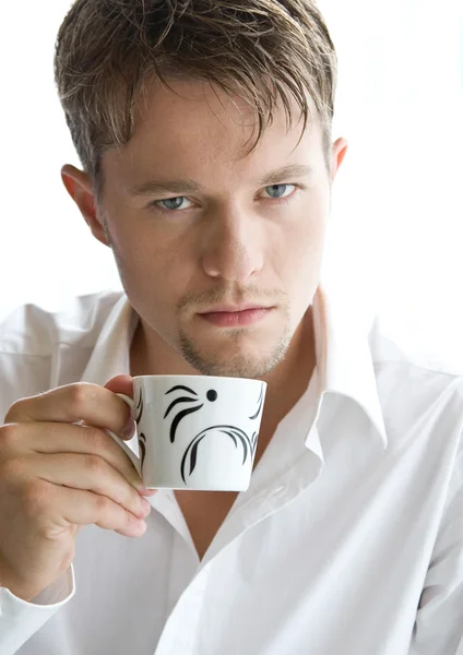 Man with a cup of coffee — Stock Photo, Image