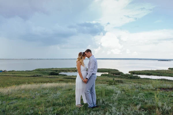 Happy Young Couple Expecting Baby Walking Summer Rainy Day Lake — Stock Photo, Image