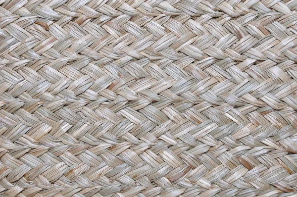 Woven surface with dry grasses — Stock Photo, Image