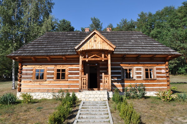 Little wooden cottage in the woods