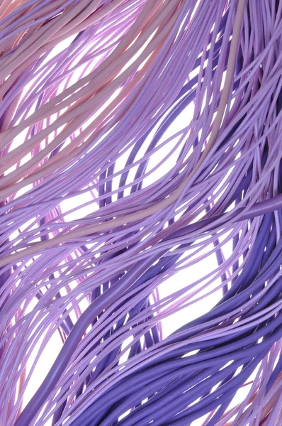 Pacotes de cabo de computador violeta — Fotografia de Stock