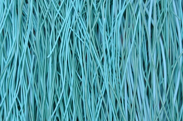 Turquoise cables, the concept of energy sources in the energy — Stock Photo, Image