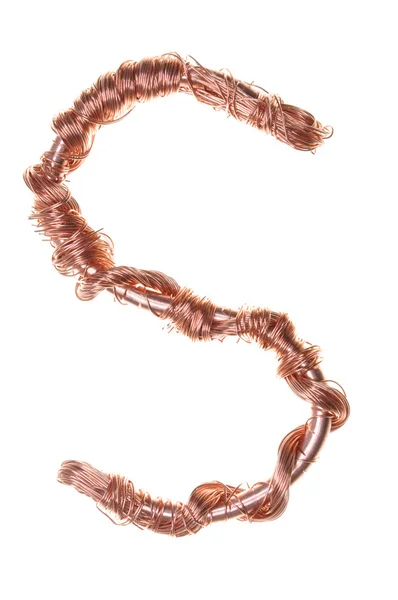 Twisted copper wire in the shape of the letter S — Stock Photo, Image