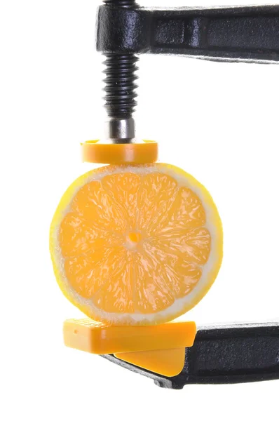 Clamp with a juicy half lemon — Stock Photo, Image