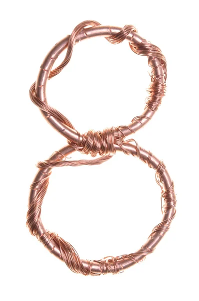 Twisted copper wire number eight — Stock Photo, Image