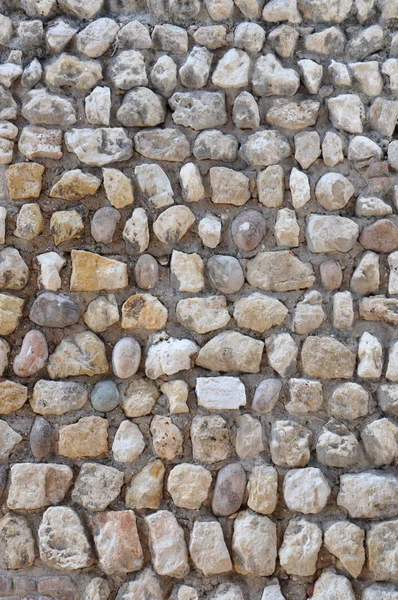 Стіна з круглих каменів — стокове фото