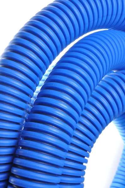 Blue corrugated pipe for electrical high-voltage cables — Stock Photo, Image