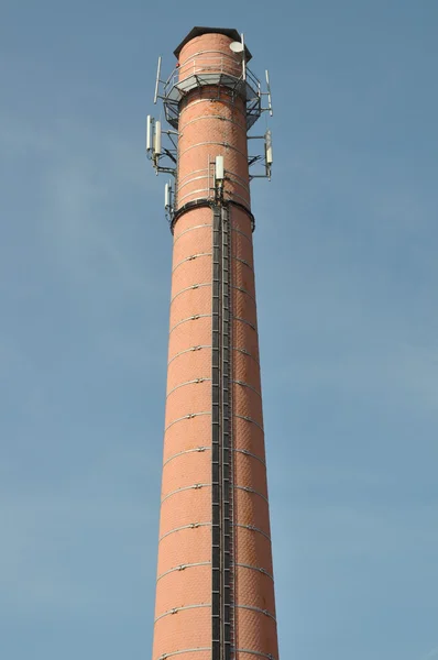 Chimney with antennas for cellular communications — Stock Photo, Image